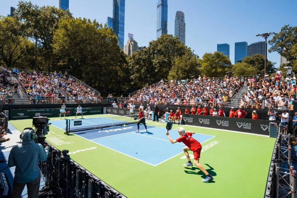 Exciting Major League Pickleball game with players in action outdoors.
