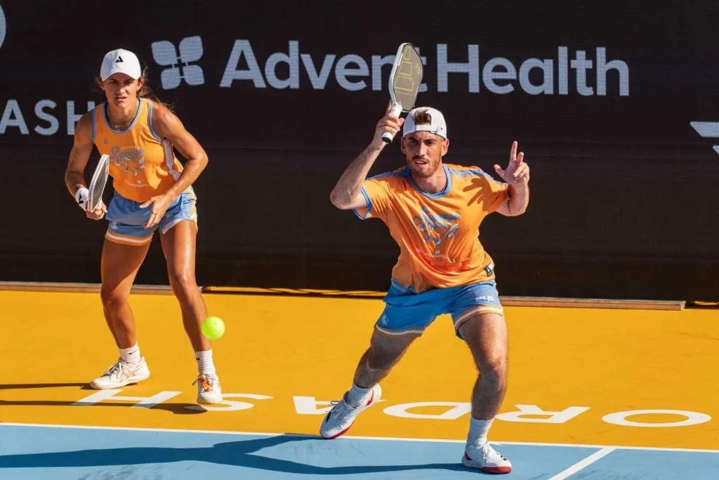 Players competing in a pickleball match at Major League Pickleball event.