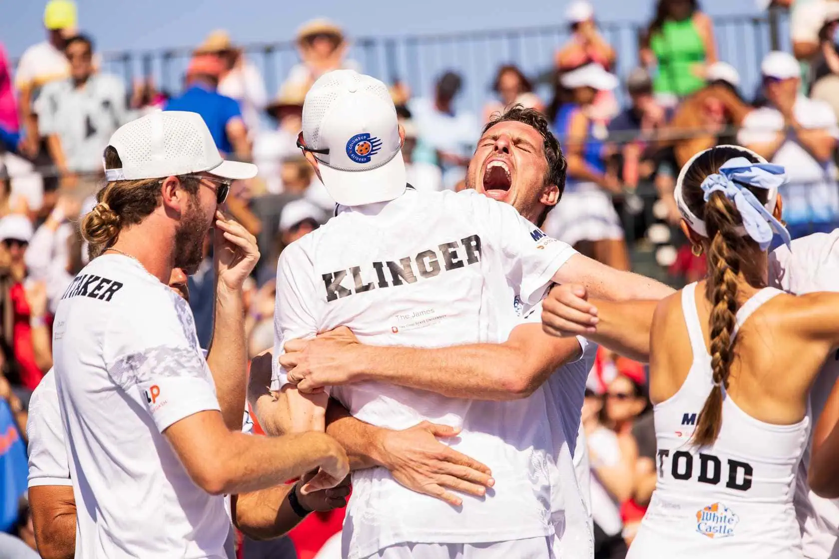 Celebrating a winning moment at Major League Pickleball tournament.